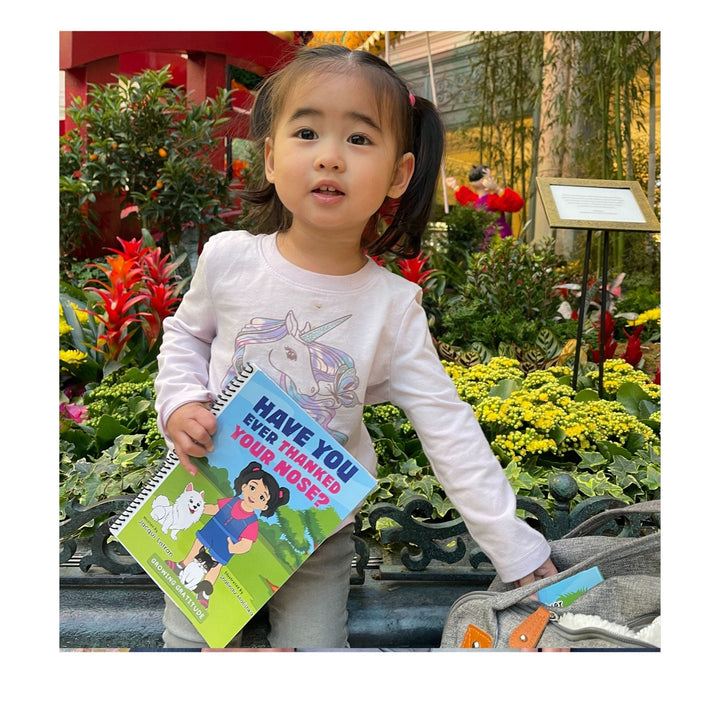 Close-up of the eBook cover's textured surface and vivid title font from a top-down angle, highlighting the design details.