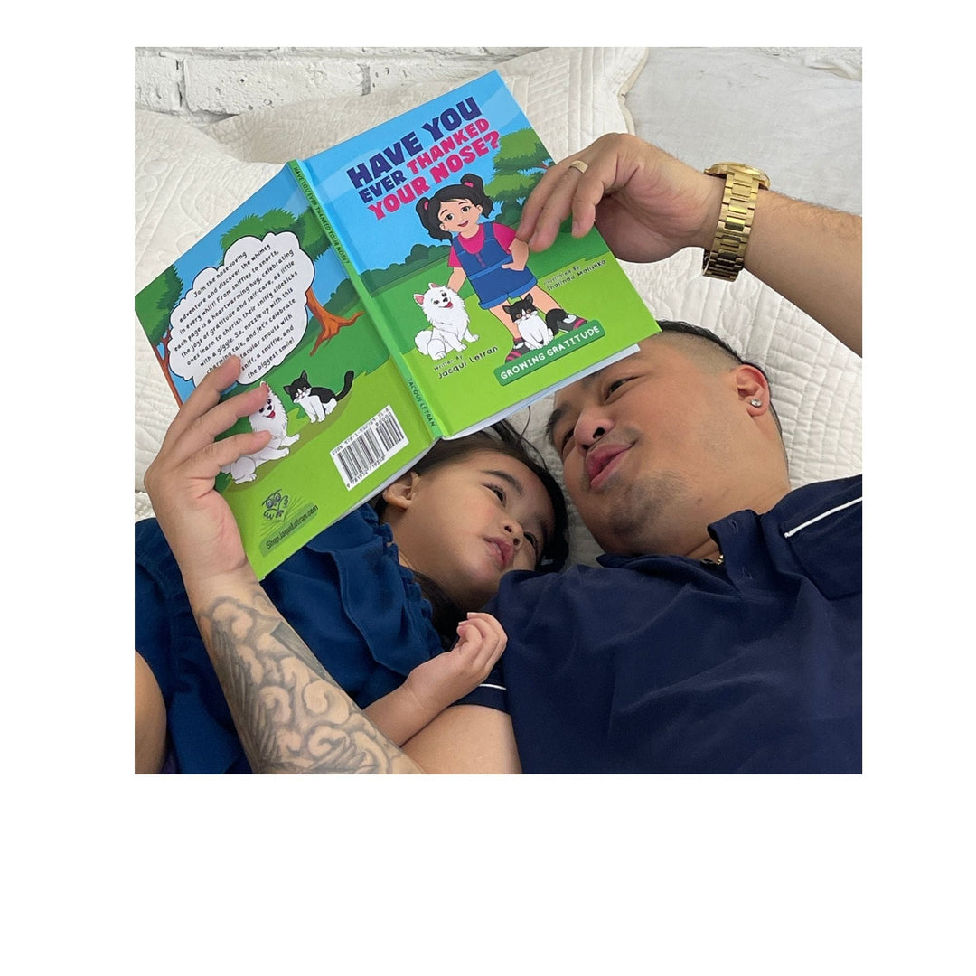 Close-up of the textured hardcover cover featuring embossed title and orange spine with subtle fabric weave detail.