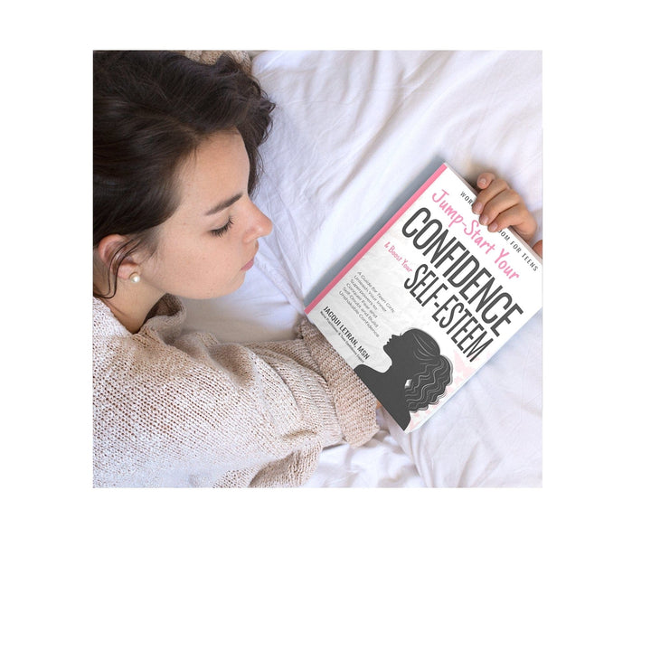 Close-up of hardcover spine displaying embossed title and textured cover material from a 2023 edition of the confidence