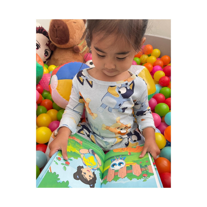 Close-up of the hardcover's textured navy blue fabric cover with embossed title "Have You Ever Thanked Your EYES?" from an