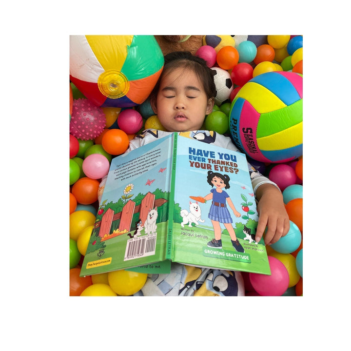 Close-up of textured hardcover surface with embossed title and subtle fabric grain detail from a top-left angle.