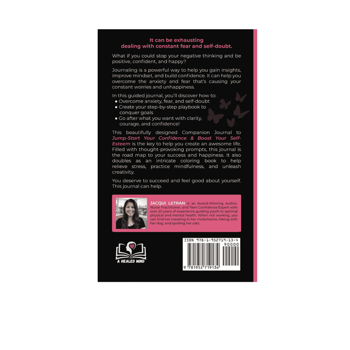 Close-up of the journal’s textured cover with embossed title and vibrant pink accents on a flat lay.