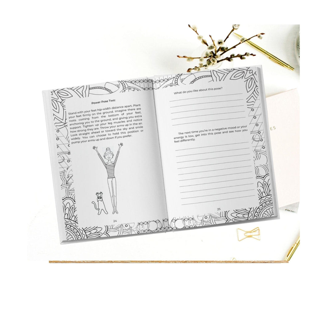 Close-up of the journal’s textured cover featuring vibrant pink and purple floral illustrations, highlighting the inspiring