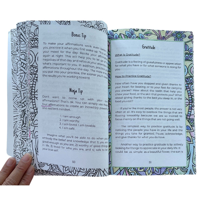 Close-up of the spiral binding and textured cover, showcasing the durable silver coil and vibrant teal background of the