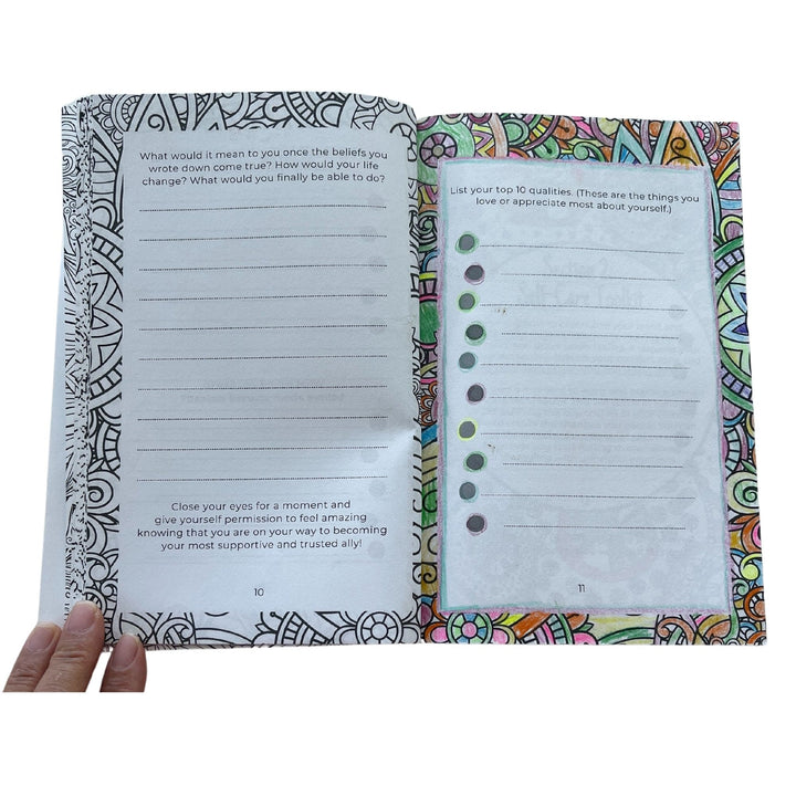 Close-up of the black spiral binding and textured cover edges of the Teen Girls bundle, highlighting the durable