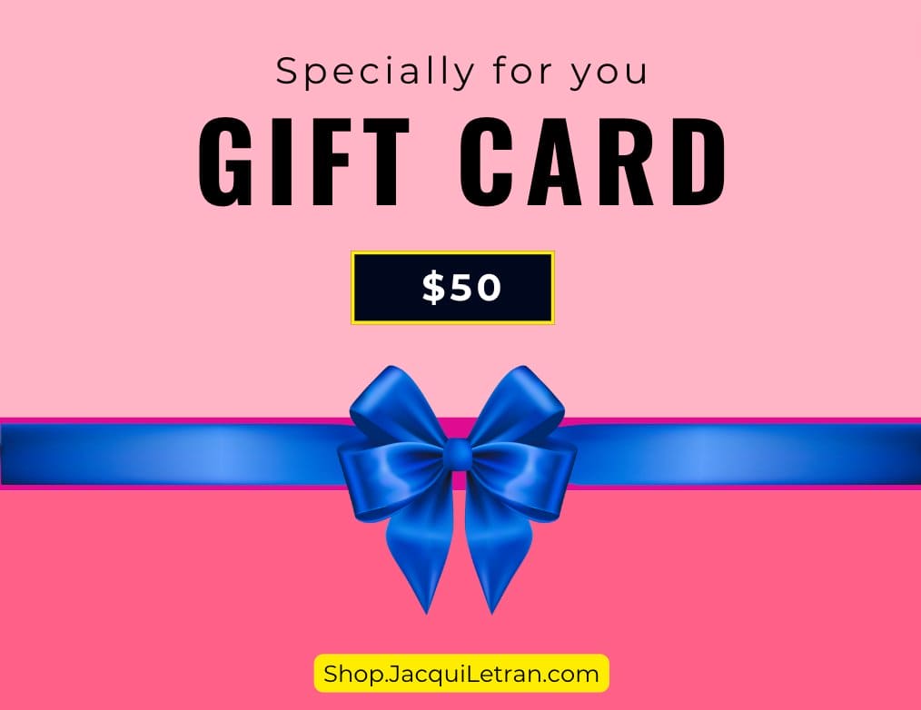 Close-up of the gift card's textured surface with embossed lettering and vibrant red and gold foil accents.