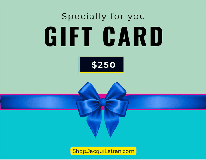 Close-up of a gift card with festive red and green striped border, showing textured paper surface and holographic foil