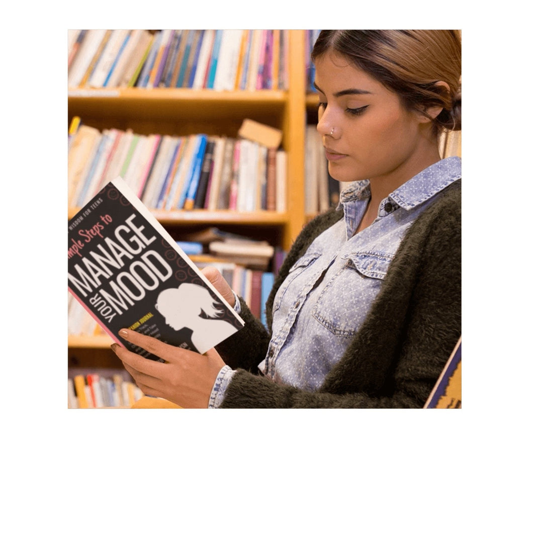 Close-up of the spiral binding and textured cover featuring motivational quotes on the Teen Girls mood journal page